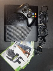 Microsoft Xbox 360 E Black 4GB Console with Power Cords And 4 Games Works