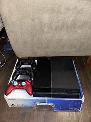 Sony PlayStation 4 Home Console – Black with cables