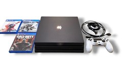 PlayStation 4 Pro 1TB Bundle with Controller, Cables, And 3 Games