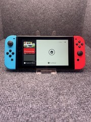 Nintendo Switch Console 32GB 1080p HDMI w/Red/Blue Joy-Con Controllers READ