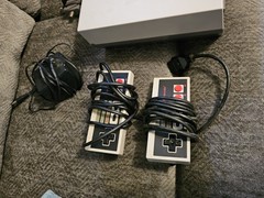 Original NES Console With Controllers, Hookups, Guns, Joysticks And Mega Man 2