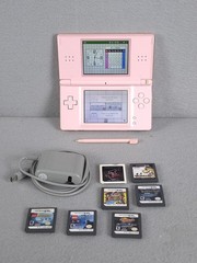 Nintendo DS Lite Console USG-001 with charger – Coral Pink W/6 Games Good Cond.