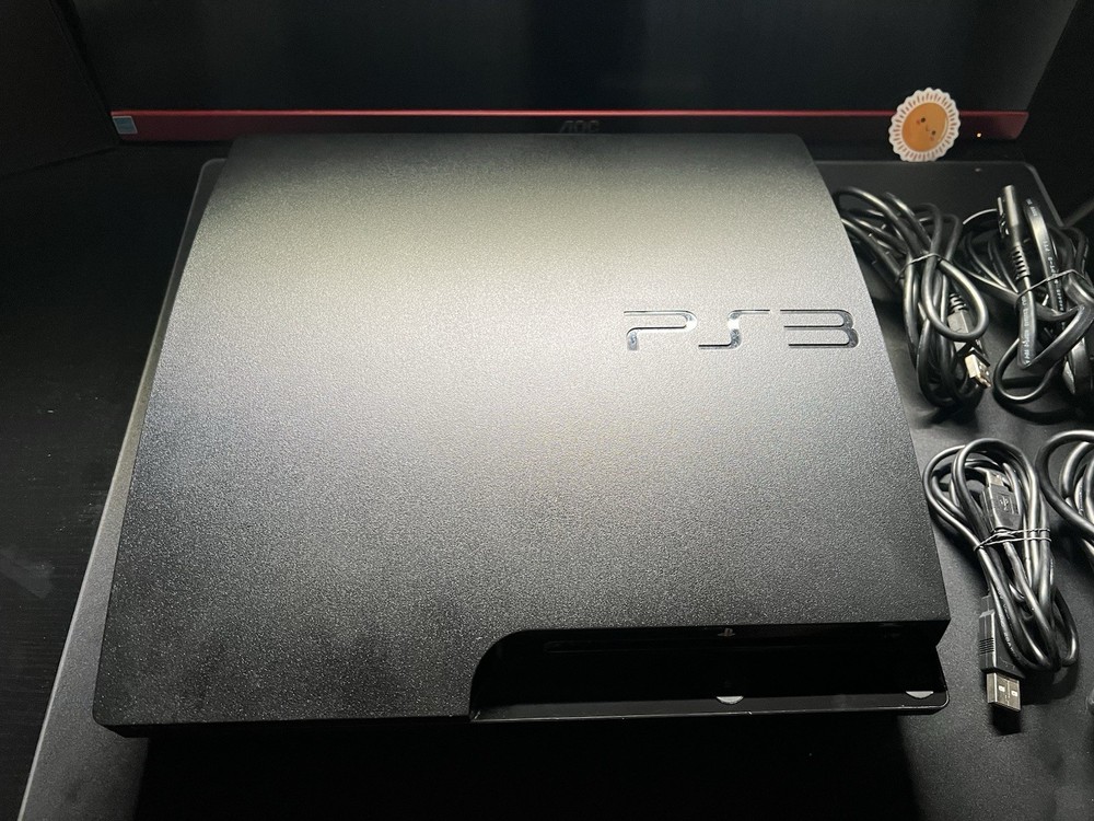 PS3 Slim Console + 4 Controllers