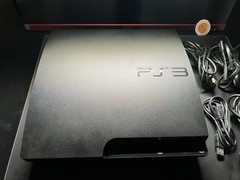 PS3 Slim Console + 4 Controllers