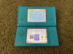 Nintendo DSi Handheld System Blue + Sonic Classic Collection bundle lot console