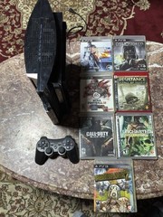 Sony PlayStation 3 80GB Console Bundle Plus 7 Games And Controller.