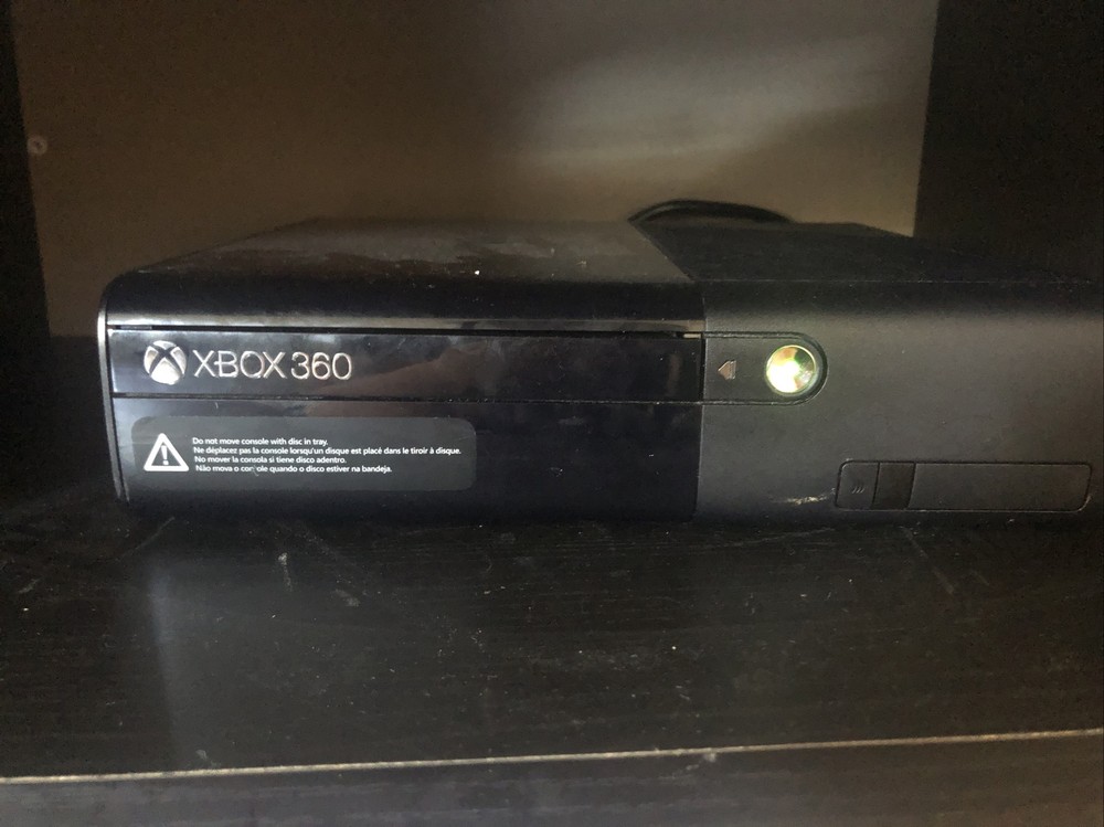 Xbox 360 E With Two Controllers, All Cables, And 20 Games