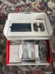 Nintendo Switch Game Console (Grey) – 32GB (Includes 128GB Micro SD Card)