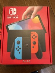 Nintendo Switch OLED Model HEG-001 Console 64GB w/ Neon Red/Blue Joy-Con Dock