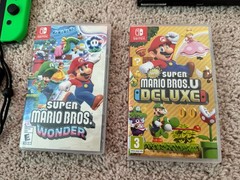 Nintendo Switch Bundle – Controllers, Mario’s Games, Travel Case, More!