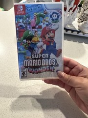 Nintendo Switch OLED with Accessories and Brand New Wonder Game