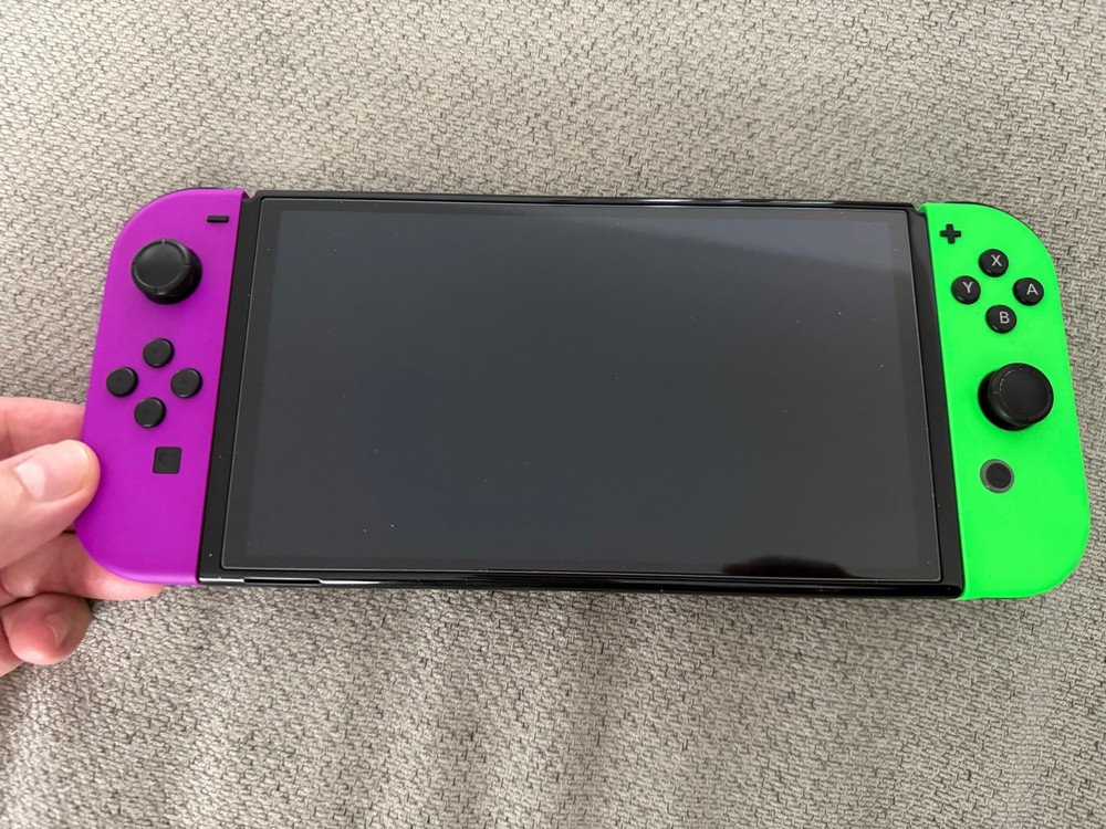 Nintendo Switch OLED with Mamba Dockable case and Carry Case