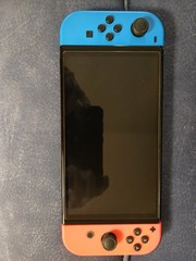 Nintendo Switch OLED Bundle W/2 Controllers, 3 Digital Mario games- USED In Box