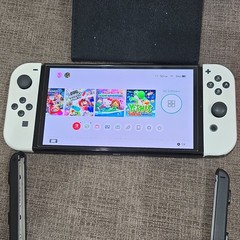 Nintendo Switch OLED 64GB With 9 Nintendo Switch Games, extra controller, + case