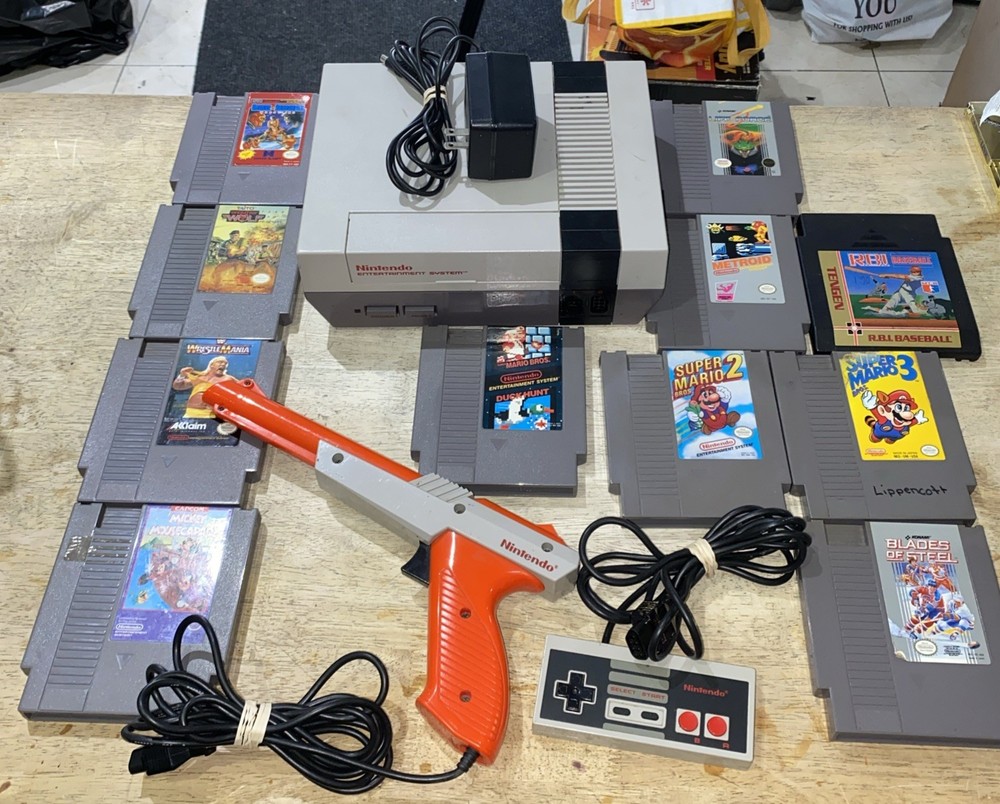 NES Console Bundle W/ Super Mario Bros. 1,2,3 & Controller/Gun & 8 Games