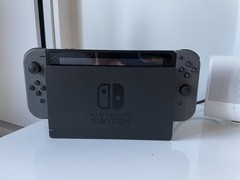 Nintendo Switch with Gray Joy Cons + Dock + Mario Tennis Aces + Extra Controller