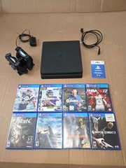 Sony PlayStation 4 Bundle 1TB HDD, 2 Controllers, Charging Mount, Games, and 25$