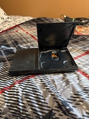 Sony PS2 Console, Controller, 4 Player Adaptor, Wires, 8mb Memory Card,& 7 Games