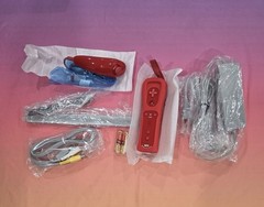 Nintendo Wii Mini Red Console Bundle with Sealed Mario Kart Wii Opened Box New