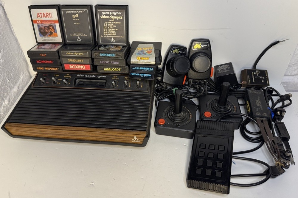 Atari 2600 Console Bundle with Controllers Cables and 12 Games TESTED