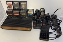 Atari 2600 Console Bundle with Controllers Cables and 12 Games TESTED