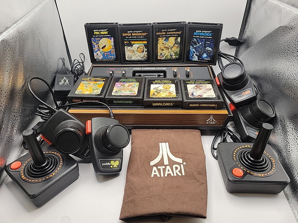 Atari 2600 System Bundle with Console ,8 Games, Joysticks, Paddles, & Dust Cover
