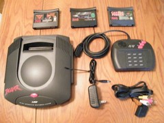 Atari Jaguar game console with games