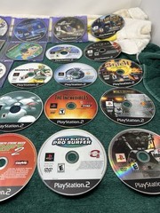Sony PlayStation 2 Slim Bundle,2 Controllers 43 games and all cords!! Tested!
