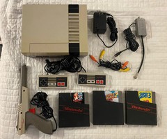 authentic NES Console Bundle with Super Mario Bros. 1,2,3 and 2 Controllers gun