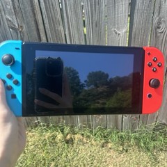 Nintendo Switch Console HAC-001 – 32GB 720p – Neon Red/Neon Blue Joy-Con