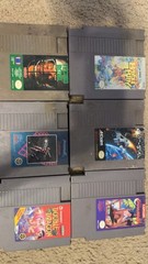 2 NES Systems 2 power cords 1 RF Switch Cable 2 Controller. 39 Different Games.