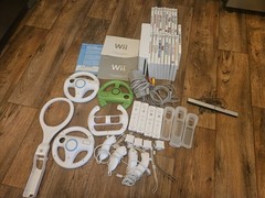Nintendo RVL-101 Wii Console – White, 4 Controllers, 4 Nunchucks, 19 Games
