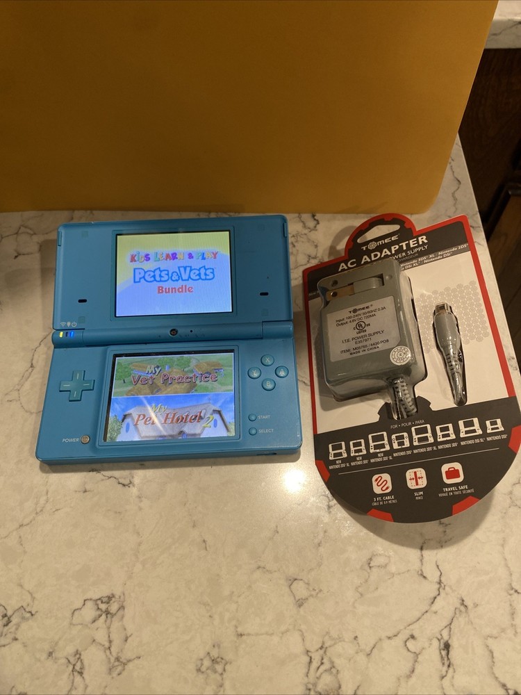 Nintendo DSi Light Blue Handheld Console Bundle (TWL-001)