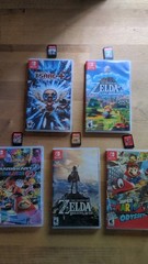 Nintendo Switch Bundle – Complete Setup + 3 Pairs of Controllers + 7 Games