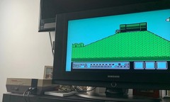 authentic NES Console Bundle with Super Mario Bros. 1,2,3 and 2 Controllers gun