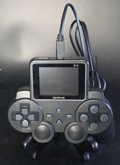 Handheld Game Console S10 Controller Style Built-In Games TV Out Rechargeable