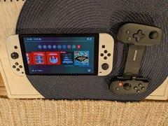 Nintendo Switch OLED- White with Backbone Handheld controller