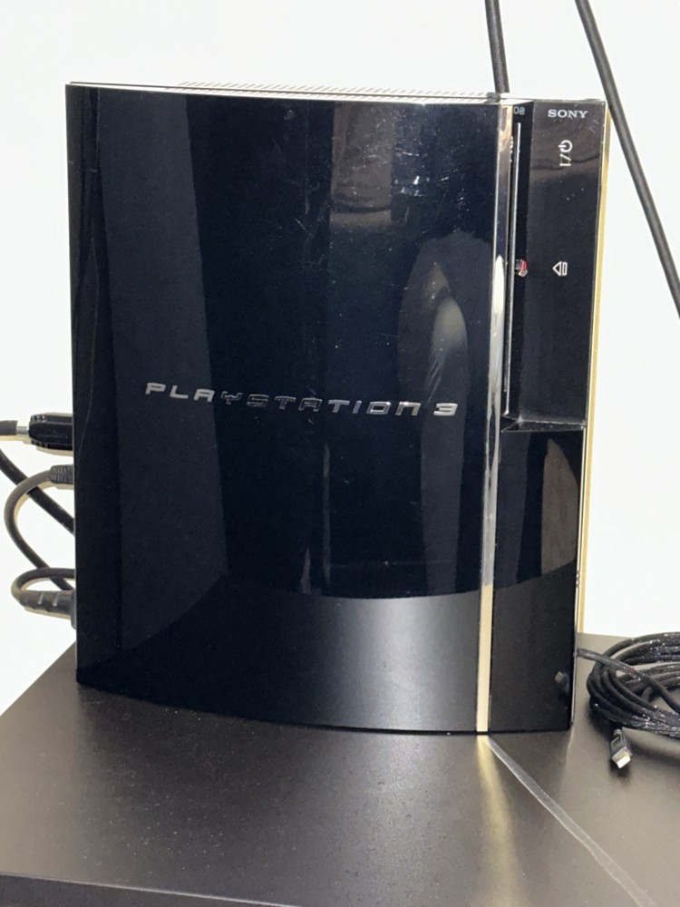 Sony PlayStation 3 Launch Edition Piano Black 1TB Console with 2 Controllers