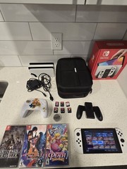 Nintendo Switch OLED Model HEG-001 Handheld Console – 64GB – White with games