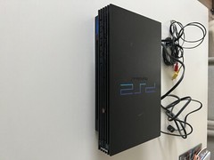 PlayStation 2 console bundle (2 controllers, 2 games, & 3 8mb memory cards)