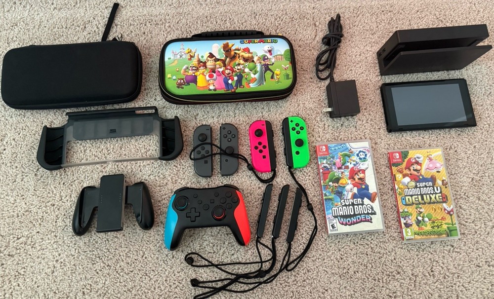Nintendo Switch Bundle – Controllers, Mario’s Games, Travel Case, More!