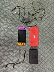 Nintendo Switch 32gb With 64gb Micro SD Card Purple And Orange Joy Cons