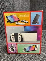 New Nintendo Switch OLED Console Gaming System HEG-001 Black/White Bundle
