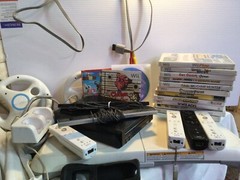 Wii U Console, Balance Board, Remotes, 14 Games, Steering wheels, Etc