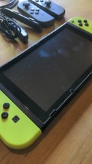 Nintendo Switch Bundle – Complete Setup + 3 Pairs of Controllers + 7 Games