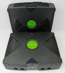 2 Original Microsoft Xbox Consoles – Powers On – For Parts Or Repair