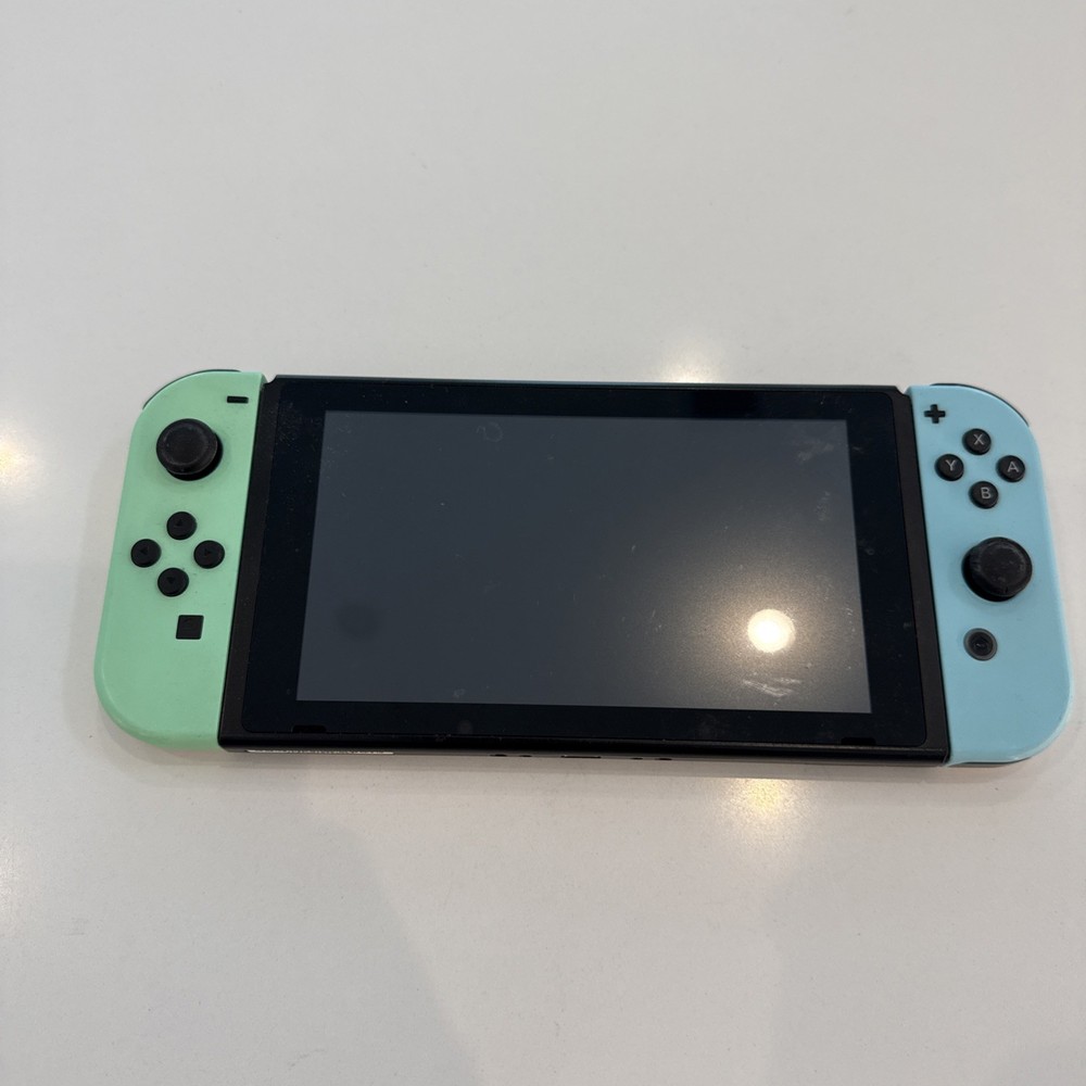 Nintendo Switch Console Multicolor Joy-Cons HDMI USB-C Wi-Fi Capable.Works great