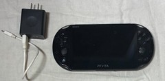 Sony PS Vita (Model: PCH-2001) Slim Handheld Console with compatible charger