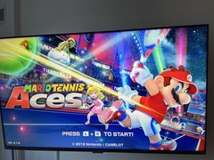 Nintendo Switch with Gray Joy Cons + Dock + Mario Tennis Aces + Extra Controller
